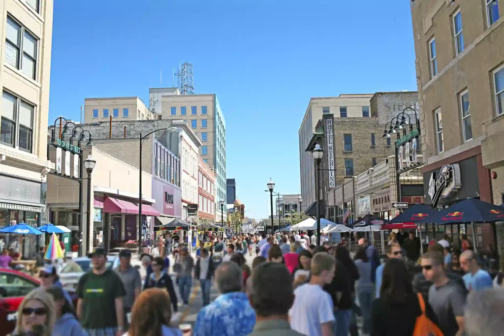 Attendees at an outdoor fall festival in downtown Springfield Missouri