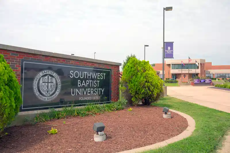 Southwest Baptist University sign and academic building