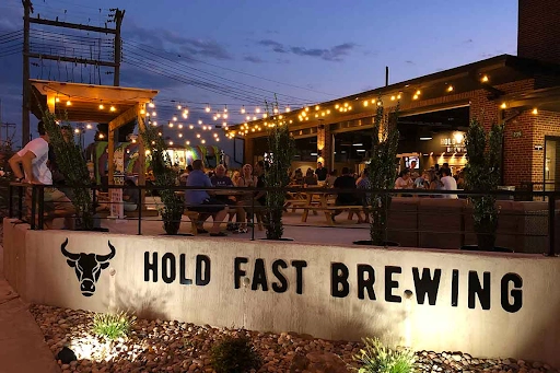 View of Hold Fast Brewery's signage and outdoor patio