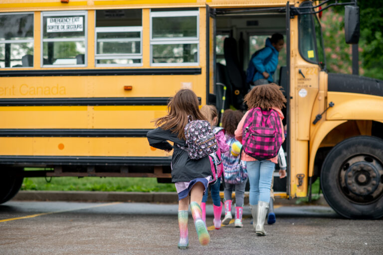 Students boarding a Springfield Public Schools bus in Springfield, MO